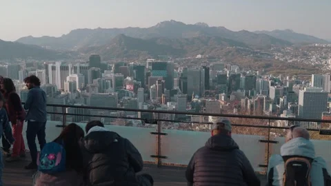 Visitors enjoying panoramic skyline view observation deck in Seoul, South Korea Stock-Footage 333647308