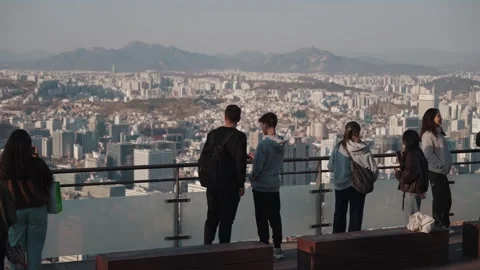 Visitors enjoying panoramic skyline view observation deck in Seoul, South Korea 스톡 동영상 333647326