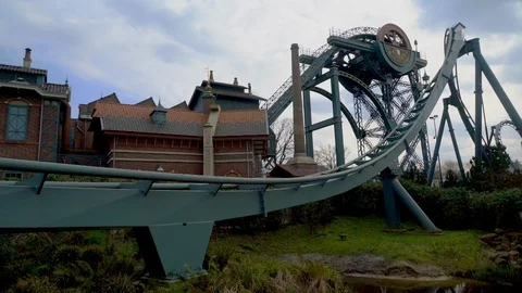 Visitors enjoying a ride in a rollercoaster. Stock Footage 126009196