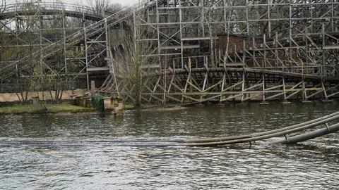 Visitors enjoying a ride in a rollercoaster. Stock Footage 126009206