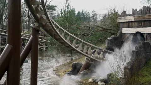 Visitors enjoying a ride in a rollercoaster. Stock Footage 126009211