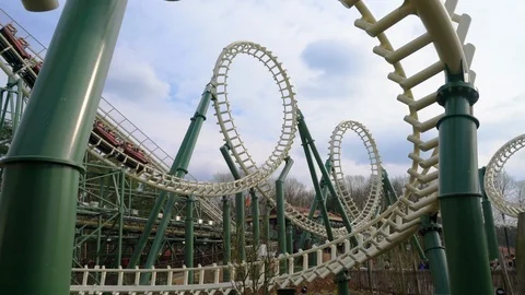 Visitors enjoying a ride in a rollercoaster. Stock Footage 126009232