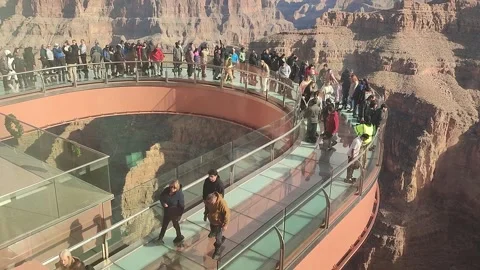 Visitors enjoying the Skywalk at Eagle point Stock Footage 305492007