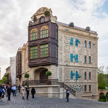 Visitors explore the charming streets of Old Town Icherisheher in Baku Stock Photos