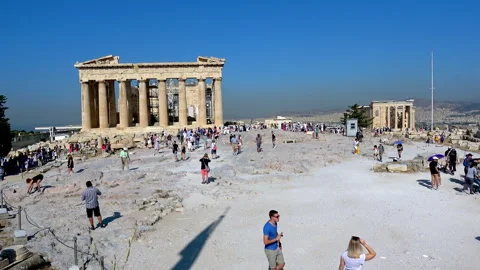 Visitors explore the Parthenon at the Acropolis in Athens Greece Stock Footage 339077679