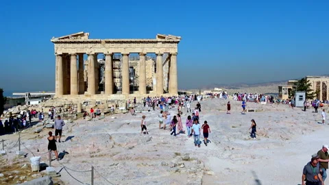 Visitors explore the Parthenon at the Acropolis in Athens Greece Stock Footage 339205464