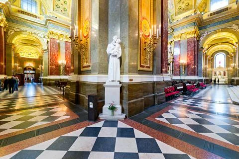 Visitors explore St. Stephen's Basilica in Budapest Stock Photos