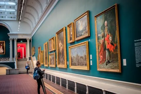 Visitors exploring the grand Gallery at Dublins National Gallery of Ireland Stock Photos