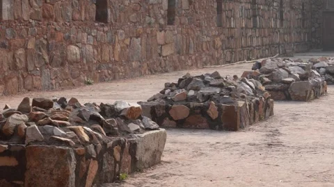 Visitors Exploring Old Stone Fort Structure in India Stock Footage 323099133