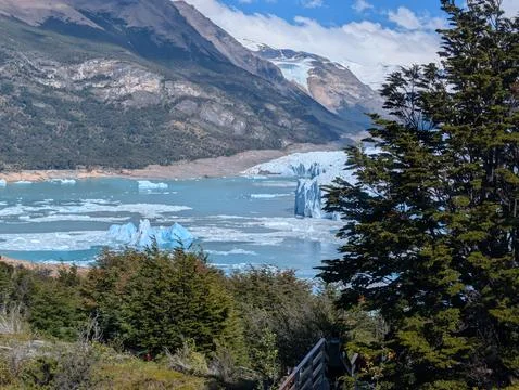 Visitors exploring Perito Moreno Glacier viewpoints in Patagonia Stock Photos
