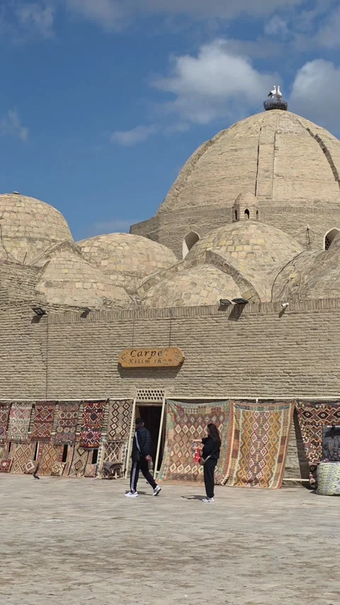 Visitors exploring a traditional bazaar in Bukhara, Uzbekistan. April 08.2026 Видео 338004437
