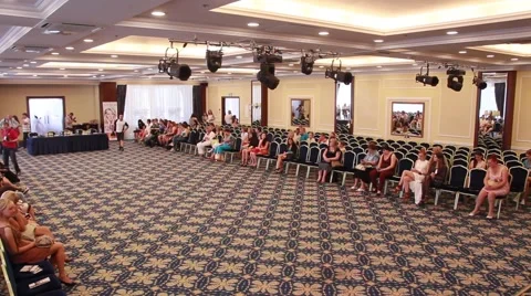 Visitors fill the room Stock Footage 48060534
