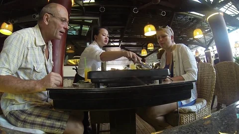 Visitors to the fish restaurant 2 Stock Footage 72140896