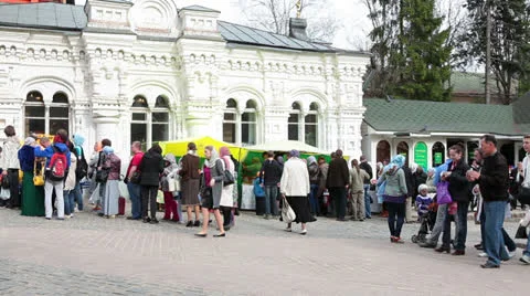 Visitors to Holy Trinity St. Sergius Lavra buying Easter cakes, Russia Stock Footage 24078686