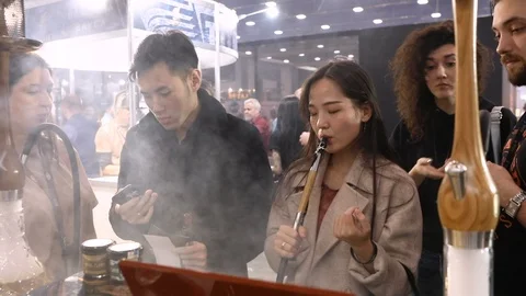 Visitors Of Hookah Exhibition Stock-Footage 104748239