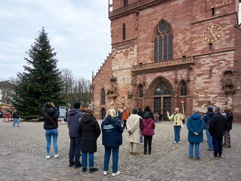 Visitors at the Iconic Basel Minster 스톡 사진