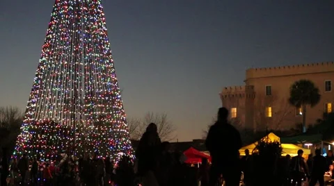 Visitors looking at christmas light decorations in park Stock Footage 45567198