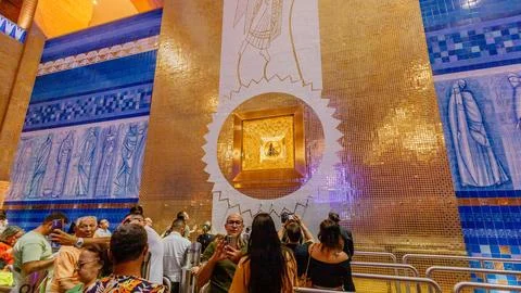 Visitors looking at the original statue of Our Lady of Aparecida, Rio de Ja.. Stock Photos