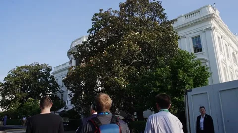 Visitors outside the White House during the UFC set-up Stock Footage 345283479