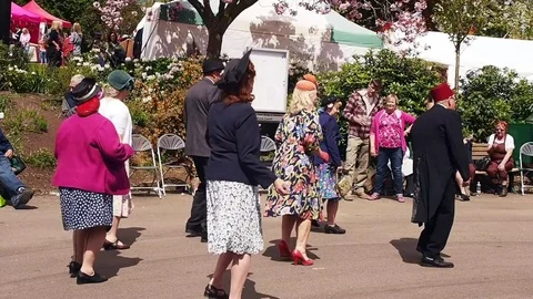 Visitors partaking in the 1940's tea dance at Howarth Stock Footage 71575170