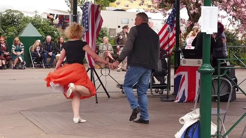 Visitors partaking in the 1940's tea dance at Howarth Stock Footage 72317724