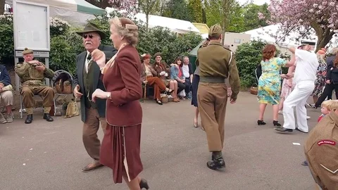 Visitors partaking in the 1940's tea dance at Howarth Stock Footage 72318188