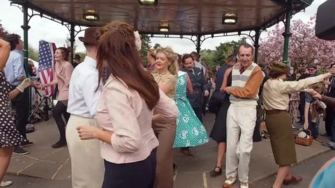 Visitors partaking in the 1940's tea dance at Howarth Stock Footage 72318468