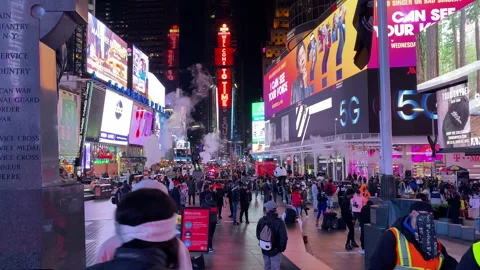 Visitors pass through Times Square Manhattan during preparations New Years 2020 Stock Footage 143480329