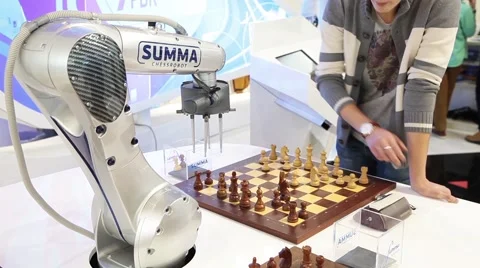 Visitors playing with robot chess Stock Footage 61092936