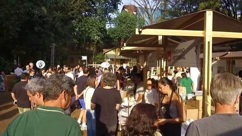 Visitors Queue Up For Buying Accessories - Tilt Down Stock Footage 118519440