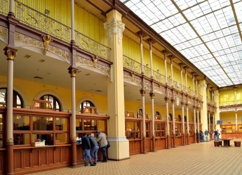 Visitors stand near the Windows of the post office in Petersburg on a Sunny d Stock Photos