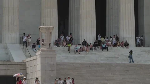 Visitors on the steps of the Lincoln Memorial Stock Footage 345283429