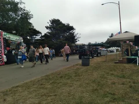 Visitors strolling through the county fair Stock Photos