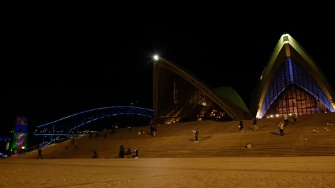 Visitors on Sydney Opera House steps during VIVID 2025 6K Stock Footage 310398326