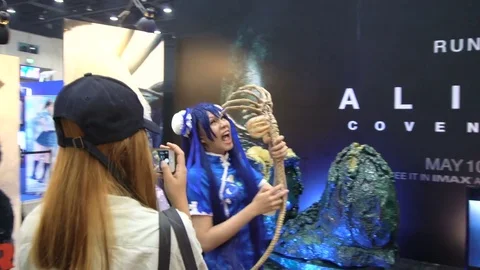 Visitors Taking Photos with Alien Decorations at Comic Con, Bangkok, Thailand - Stock Footage 76119920