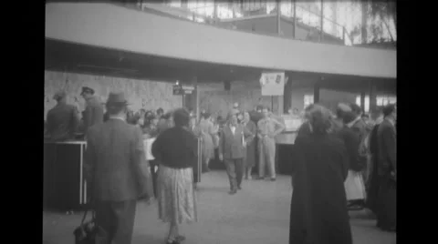 Visitors at the temporary Belgium Post Office at Brussels World's Fair Stock Footage 37595054