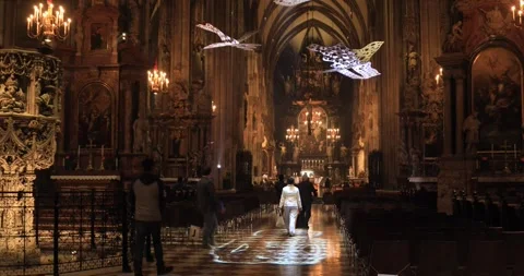 Visitors under light art installation in St. Stephen's Cathedral, Vienna Stock Footage 321031259
