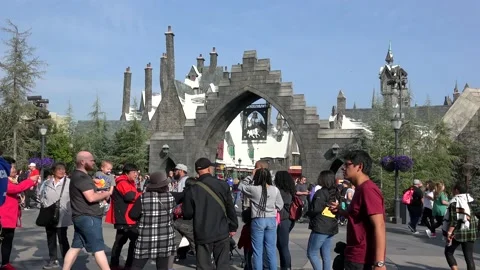 Visitors of the Universal Studios near The Wizarding World of Harry Potter. LA Stock Footage 149112230