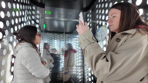 Visitors using the glass elevator to reach the top of Metropol Parasol 库存影片 302840419