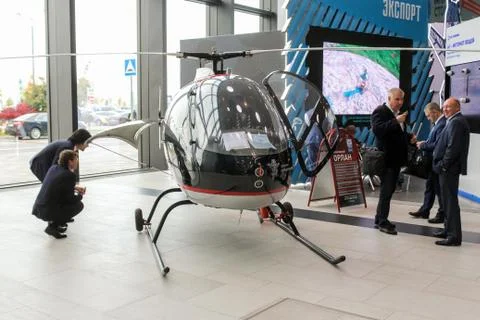 Visitors view the helicopter. Stock Photos