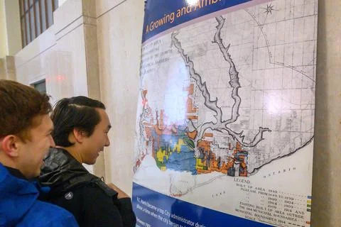 Visitors viewing Toronto's growth map at the R. C. Harris. Stock Photos