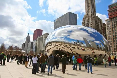 Visitors visit bean or cloud gate at millennium park Stock Photos