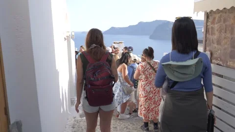 Visitors Waiting for Iconic Viewpoint in Oía Stock Footage 336132761
