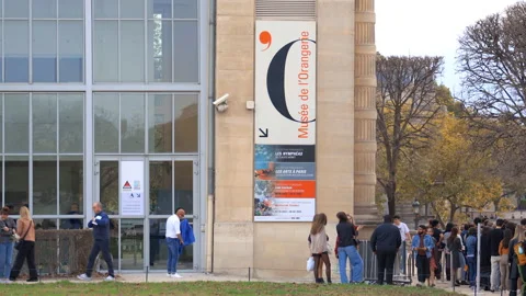 Visitors waiting in line outside the Musée de l'Orangerie building in Paris Stock Footage 231243648