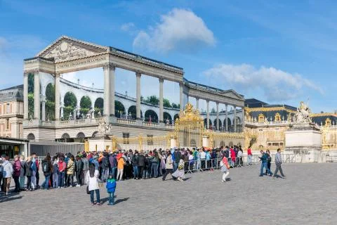 Visitors waiting in a queue to visit the Palace of Versailles, Paris, France Stock Photos