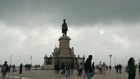 Visitors walk across Commerce Square in Lisbon Stock Footage 338174164