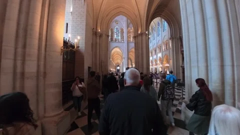 Visitors Walk Through a Grand Cathedral Filled With Towering Arches, Stained Stock Footage 333401662