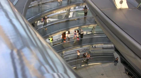 Visitors walking along inside the Reichstag viewed from a high angle Stock Footage 44361712