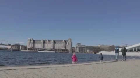 Visitors Walking Along Oslo Opera House Beachfront Stock Footage 340959956