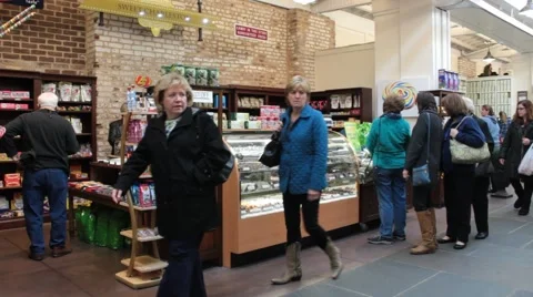 Visitors walking around convenience store Stock Footage 45533180